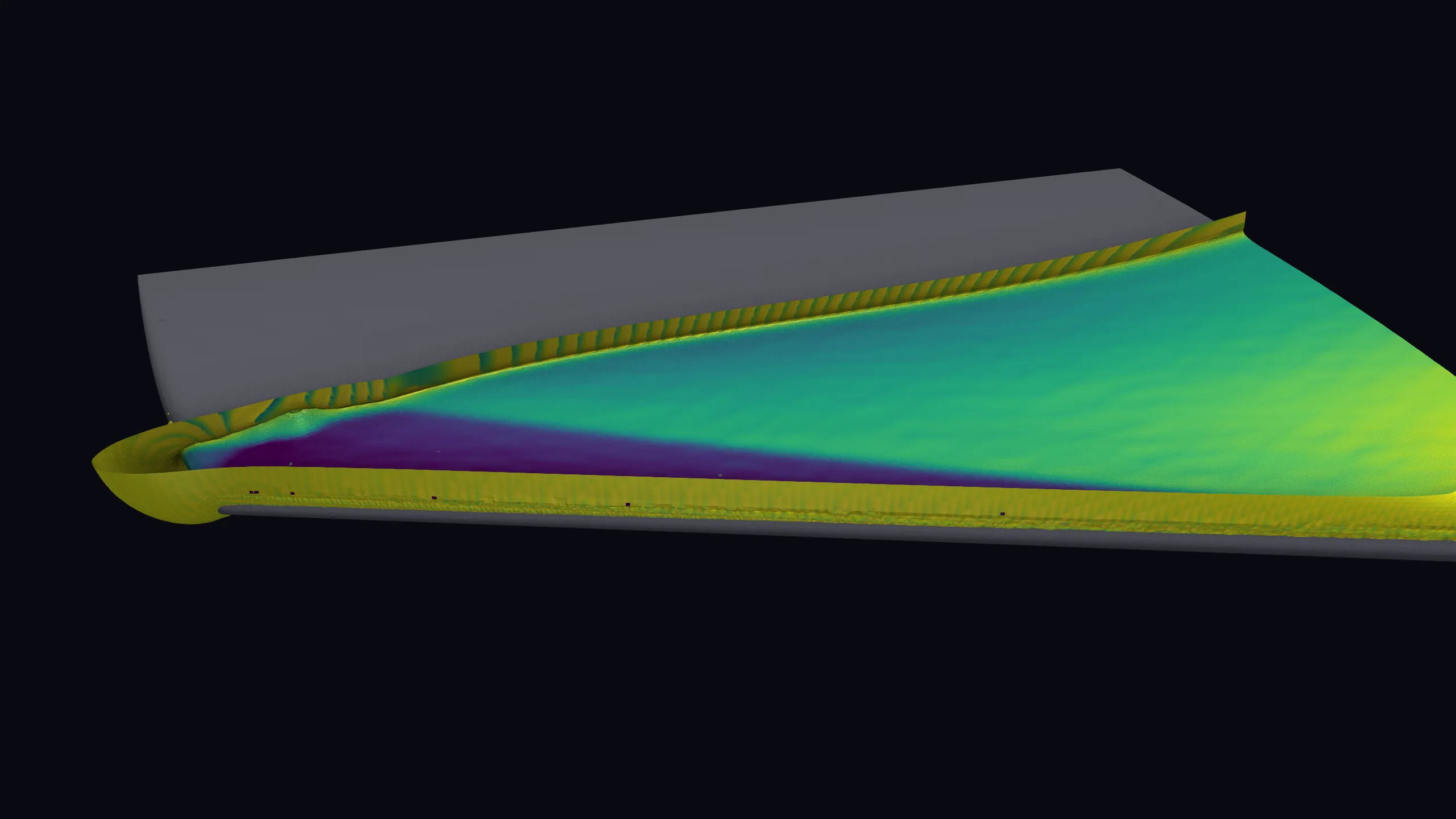 The supersonic pocket rendered as an isosurface on the upper surface of the wing, viewed from outboard